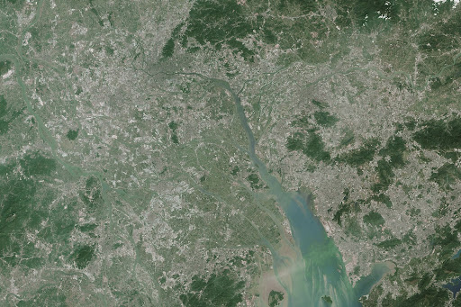 Regiões como o Delta do Rio das Pérolas, na China, têm cidades com dezenas de milhões de habitantes e estão se integrando. (Fonte:  Wikimedia Commons)