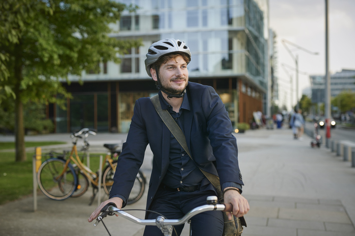 Businessman cycling in the city