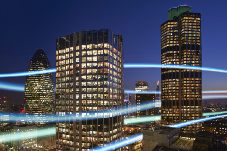 Financial district of London with light streams